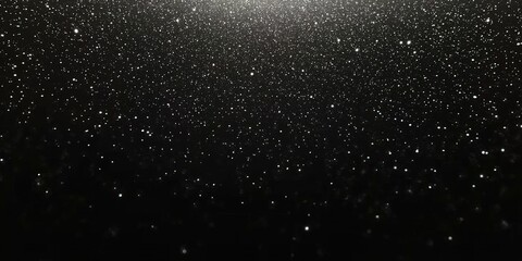Obraz premium small white particles on Black background , Small white dust particles floating in air