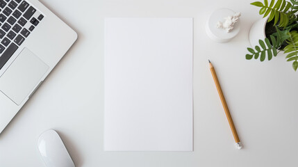 top view of Empty Resume Paper Mockup on Office Table Next to Laptop and Pencil - Vertical White Document for Business CV and Job Application Photo