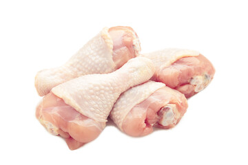 Raw chicken drumsticks isolated on white background