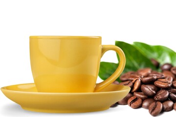 Cup of hot tasty coffee and coffee beans