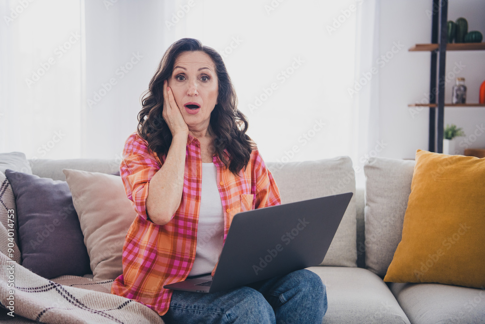 Canvas Prints Photo of adorable shocked lady wear plaid shirt getting emails modern device indoors room home house