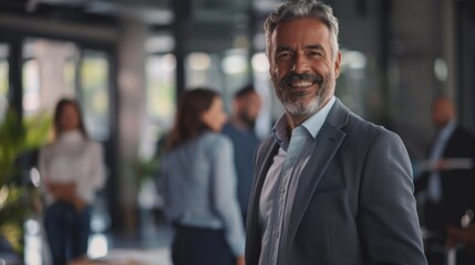 Business people stand on the background of the office corridor