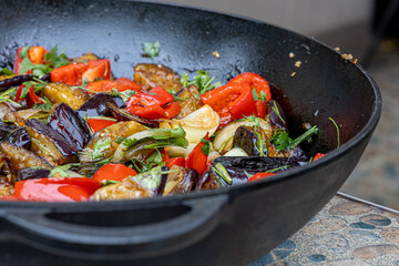 Grilled vegetable salad with zucchini, eggplant, onion, pepper and tomato
