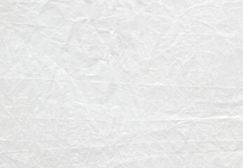 White subtle glossy crumpled paper texture as background