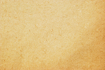 A sheet of old brown recycled cardboard texture as background