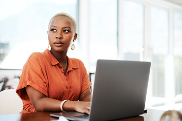 Thinking, online and black woman with laptop, serious and typing of ideas in office and...