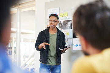 Businessman, coaching and presentation with tablet in meeting for training staff, ideas or mission...