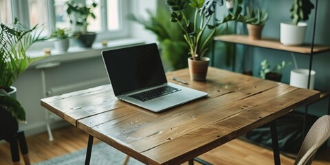 Fototapeta premium An empty wood table in a stylish home office, ready for productive work sessions and creative projects