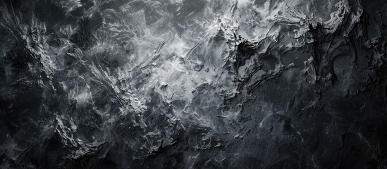 Obraz premium An abstract grey and black textured pattern background suitable for wallpapers screensavers brochure covers presentations articles featuring a copy space image for text
