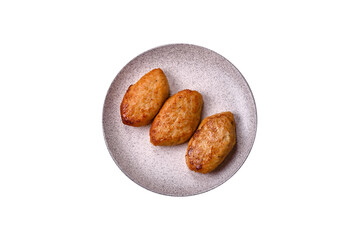 Delicious fresh fried minced fish cutlets with spices and herbs