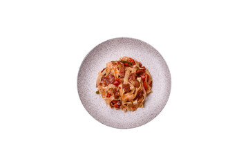 Delicious asian udon dish with vegetables, meat, salt and spices