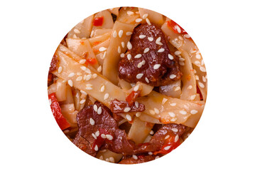 Delicious asian udon dish with vegetables, meat, salt and spices