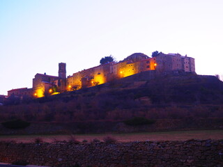 Fototapeta premium Culla, a village in Maestrazgo, Castellón, illuminated at dusk