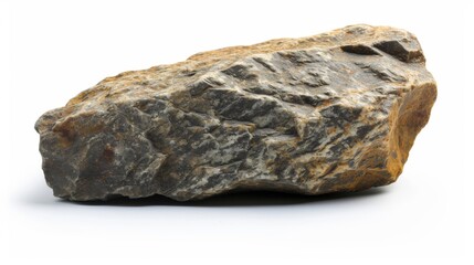 Fototapeta premium A rough rock with natural textures, isolated on a white background