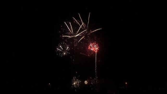 Fireworks firecracker beautiful colorful light show at night in Europe