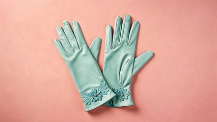 A display of elegant gloves on a pastel background