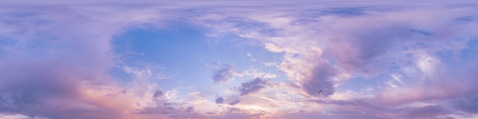 Sunset sky panorama with bright glowing pink Cumulus clouds. HDR 360 seamless spherical panorama....