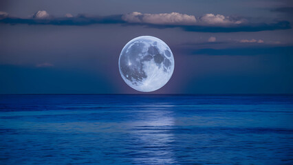 full moon over sea