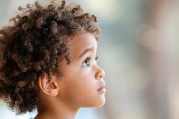 Fototapeta premium Portrait of a Child Displaying Fearful Expression - Mental Health and Anxiety Concept