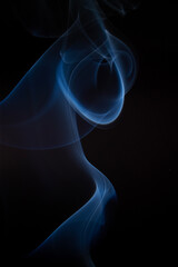 The artwork created from smoke is beautiful and gentle. Taken with a camera that has a high magnification rate.