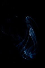 The artwork created from smoke is beautiful and gentle. Taken with a camera that has a high magnification rate.