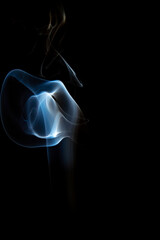 The artwork created from smoke is beautiful and gentle. Taken with a camera that has a high magnification rate.