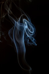 The artwork created from smoke is beautiful and gentle. Taken with a camera that has a high magnification rate.