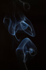 The artwork created from smoke is beautiful and gentle. Taken with a camera that has a high magnification rate.