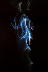 The artwork created from smoke is beautiful and gentle. Taken with a camera that has a high magnification rate.