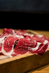 Premium slices raw marble wagyu meat for shabu shabu hot pot