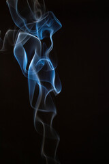 The artwork created from smoke is beautiful and gentle. Taken with a camera that has a high magnification rate.
