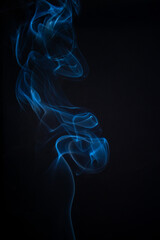 The artwork created from smoke is beautiful and gentle. Taken with a camera that has a high magnification rate.