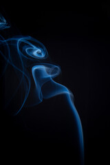 The artwork created from smoke is beautiful and gentle. Taken with a camera that has a high magnification rate.
