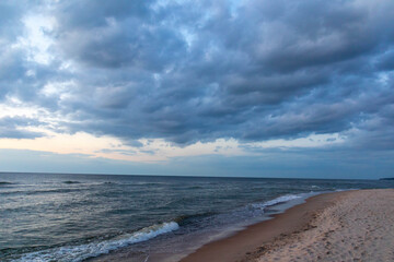 clouds over the beach