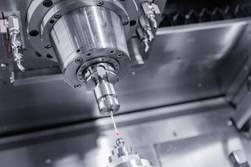 Coordinate Measuring machine probe CMM. Sensor quality control after CNC milling work. Industrial...