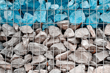 Fence from gabon stones. Close-up.
