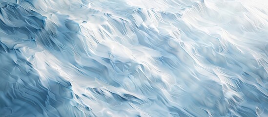 Obraz premium Top view of a mesmerizing snowy landscape with intricate wind sculpted patterns on the snow Ideal for backgrounds and designs featuring a wide panoramic copy space image