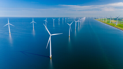 Captivating Windmill Turbines Harnessing Renewable Energy Over Tranquil Waters in the Netherlands © Fokke Baarssen