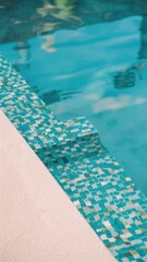 A close up of a blue and green tile mosaic in the bottom of a swimming pool, AI
