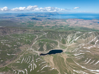 View of Nemrut Lake, the second largest crater lake in the world and the largest in Turkey, with...