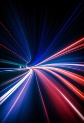 A blurred night cityscape with colorful light trails, a high-speed motion or movement