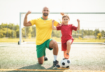 Obraz premium soccer, sport with a dad and daughter training on a court outside for leisure fitness and fun