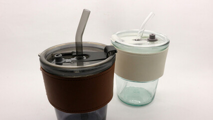 Tumbler in the form of a glass or glass mug with a modern design