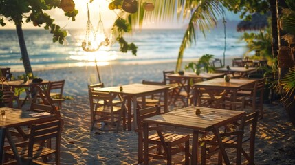 Ocean or sea sand beach restaurant or cafe with tables and chairs. Tropical island summer holiday or vacation resort food