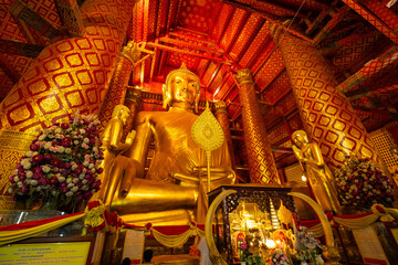 AYUTTHAYA, THAILAND - June 4, 2024 : Buddha statue at Wat Phanan Choeng temple at Wat Phananchoeng, Ayutthaya, Thailand.