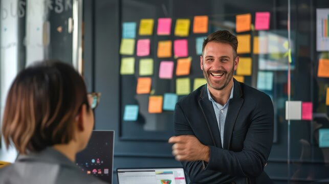 Manager providing constructive feedback to an office operator