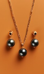 Obraz premium Elegant black pearl jewelry set on a warm beige background