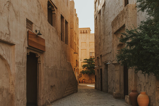 Courtyard historical district in with traditional arabic buildings exterior at sunset time