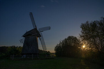 Obraz premium The old mill in the sunset. Mikhailovskoye, Pushkin Mountains. Pskov region. Russia
