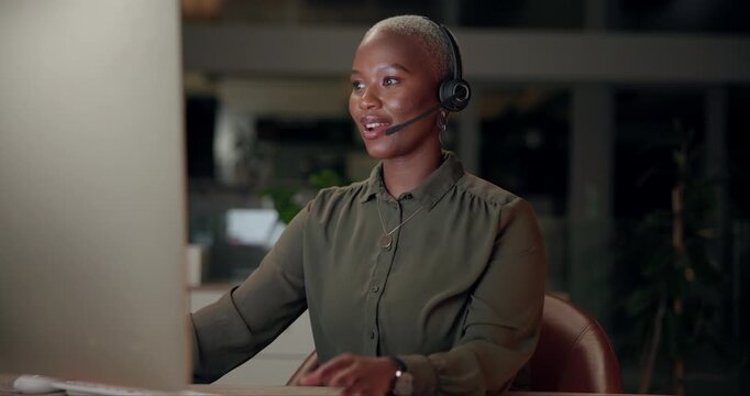 Black woman, talking and headset with computer, office and night as multilingual support agent. Female person, technology and virtual call for international contact center, conversation and help desk